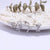 Brinco Argola Zirconia Letras - Sua Boutique