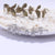 Brinco Argola Zirconia Letras - Sua Boutique