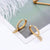 Brinco Argola Zirconia Letras - Sua Boutique
