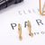 Brinco Argola Zirconia Letras - Sua Boutique