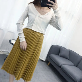 Saia Midi Plissada - Couro Ecológico você encontra na Sua Boutique por apenas  ! Com Frete Grátis para todo Brasil, podendo parcelar em até 10X Sem Juros! Alé,m disso ganhe 10% OFF no PIX! 